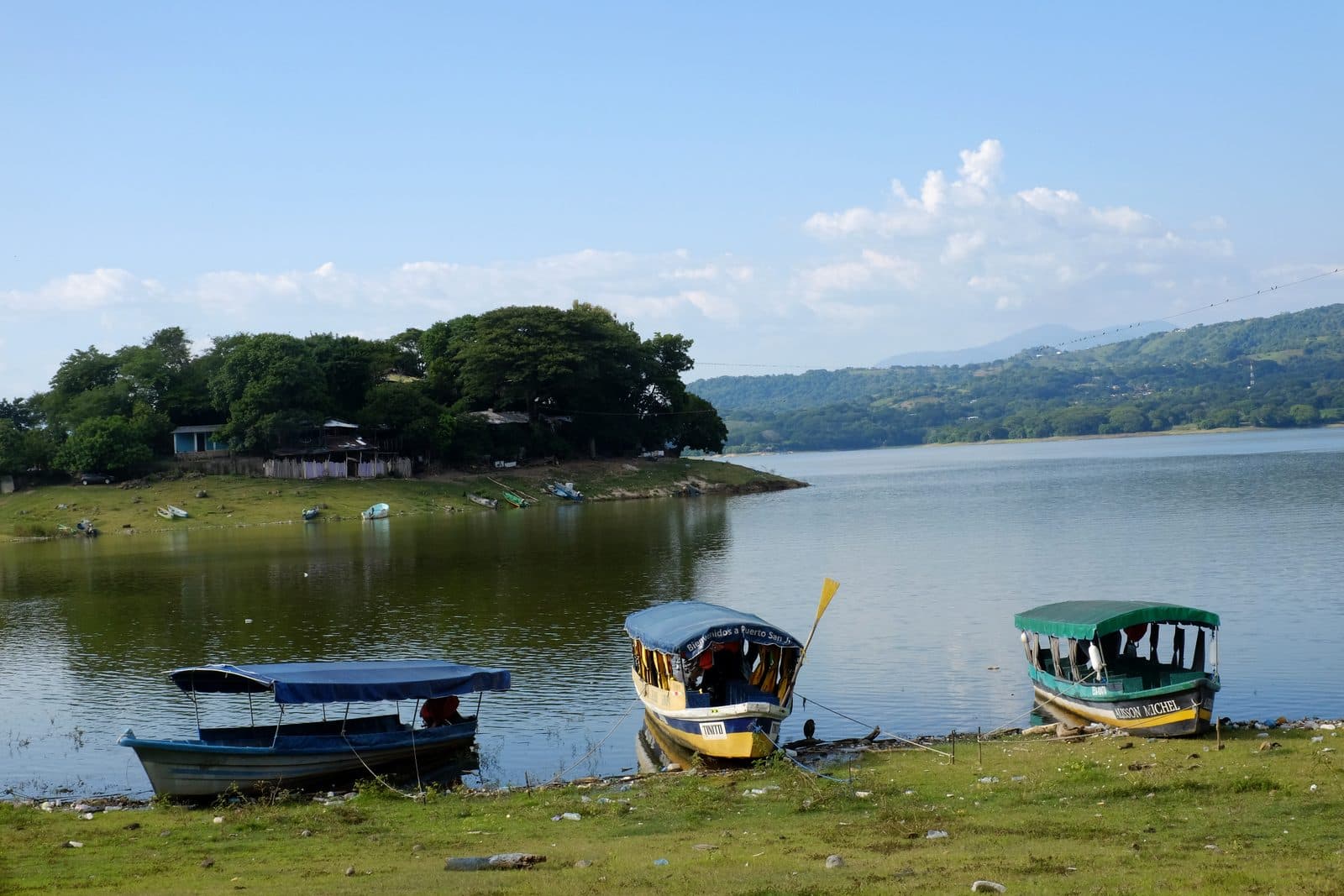 Fishing boats at the edge of Lake Suchitlán